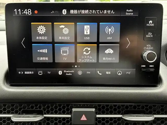 ホンダ ＺＲ－Ｖ ハイブリッド e:HEV Z 熊本県 2024(令6)年 1.3万km プラチナホワイトパール BOSEサウンド/純正ナビ/【フルセグTV/Bluetooth/USB/ラジオ】/全方位カメラ/レーダークルーズコントロール/パドルシフト/衝突軽減ブレーキ/レーンキープアシスト/先行車発進お知らせ機能/パーキングセンサー/ダウンヒルアシスト/標識認識機能/黒革シート/前席パワーシート/運転席シートメモリ/前席シートヒーター/ビルトインETC2.0/前後ドライブレコーダー（DRH-224SD）/横滑り防止機能/ブレーキホールド/純正18インチAW/ワイヤレス充電/ステアリングヒーター/革巻きステアリング/ステアリングスイッチ/オートライト/LEDヘッドライト/純正フロアマット/ドアバイザー/保証書/取扱説明書