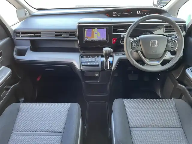ホンダ ステップワゴン スパーダ 東京都 2015(平27)年 5.7万km ホワイトオーキッドパール ワンオーナー　/両側パワースライドドア　/クルーズコントロール　/ＬＥＤヘッド／フォグランプ　/７型ナビ　/・Ｂｌｕｅｔｏｏｔｈ接続　/・ＣＤ再生　/アイドリングストップ　/わくわくゲート　/ＥＣＯＮスイッチ　/バックカメラ/ETC