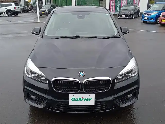 ＢＭＷ ２１８ｉ アクティブツアラー 福井県 2017(平29)年 2.2万km 黒 衝突被害軽減システム/クルーズコントロール/純正メーカーナビ/・（CD/DVD/Bluetooth/USB/FM/AM）/バックカメラ/ビルトインETC/前後ドライブレコーダー/電子パーキング/前席シートヒーター/オートLEDライト/オートワイパー/純正16インチAW/スマートキー