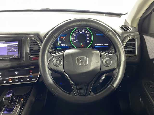 ホンダ ヴェゼル ハイブリッド X 沖縄県 2016(平28)年 10.6万km クリスタルブラックパール 禁煙車/ホンダセンシング/社外ナビ/・ＣＤ／ＤＶＤ/・フルセグＴＶ／Ｂｌｕｅｔｏｏｔｈ/フリップダウン/クルーズコントロール/バックカメラ/純正ホイール/ステアリングリモコン/パドルシフト/スペアキー/ETC/取扱説明書/保証書