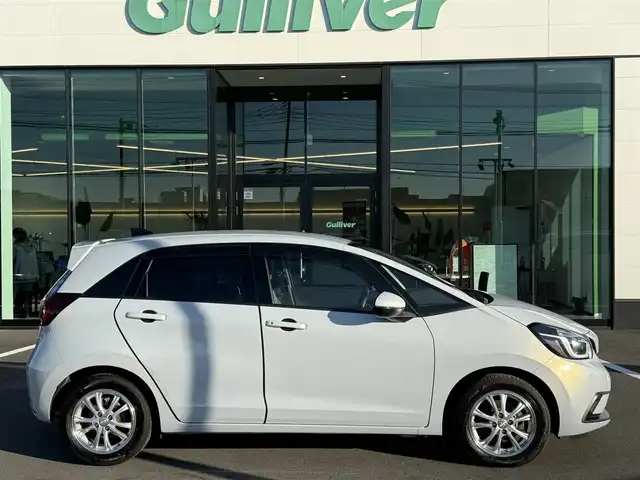 ホンダ フィット e:HEVベーシック 栃木県 2020(令2)年 11.8万km プレミアムサンライトホワイトパール ホンダセンシング /レーダークルーズ/レーンアシスト/クリアランスソナー /純正ナビ/Bluetooth/DVD再生/バックカメラ/フルセグTV/LEDヘッドライト/ETC/スマートキー×2