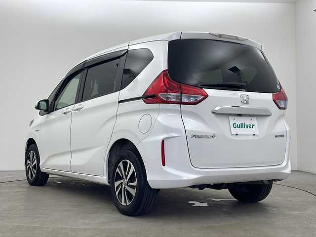 ホンダ フリード＋ ハイブリット G ホンダセンシング 秋田県 2016(平28)年 5.5万km ホワイトオーキッドパール 4WD/純正ナビ/（AM/FM/BT/CD/DVD）/フルセグTV/バックカメラ/両側パワースライドドア/ホンダセンシング/衝突被害軽減ブレーキ/レーンキープアシスト/レーダークルーズコントロール/純正ETC/オプションラゲッジマルチボード/オプションルーフラック/ハーフレザーシート/前席シートヒーター/オートライト/LEDヘッドライト/フォグランプ/純正15インチアルミホイール/純正フロアマット