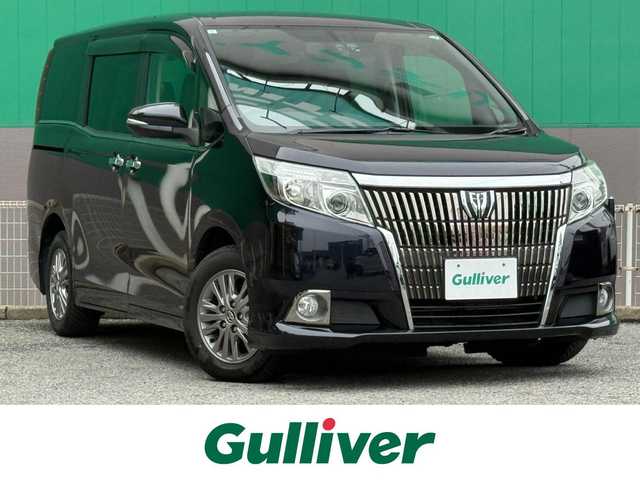 トヨタ エスクァイア Gi 千葉県 2015(平27)年 4万km スパークリングブラックパールクリスタルシャイン 純正SDナビ/　(CD/DVD/SD/Bluetooth)/フルセグTV/バックカメラ/フリップダウンモニター/ドライブレコーダー (DRT-H64R)/ビルトインETC/ステアリングスイッチ/クルーズコントロール/アイドリングストップ/両側パワースライドドア/合成皮革シート/前席シートヒーター/リア席サイドサンシェード/オートライト/オートハイビーム/LEDヘッドライト/フォグランプ/電動格納ミラー/ドアバイザー/電動コーナーポール/純正フロアマット