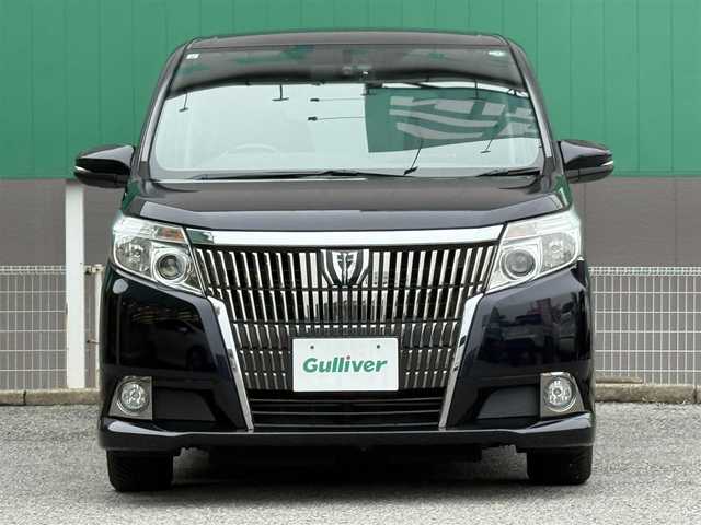トヨタ エスクァイア Gi 千葉県 2015(平27)年 4万km スパークリングブラックパールクリスタルシャイン 純正SDナビ/　(CD/DVD/SD/Bluetooth)/フルセグTV/バックカメラ/フリップダウンモニター/ドライブレコーダー (DRT-H64R)/ビルトインETC/ステアリングスイッチ/クルーズコントロール/アイドリングストップ/両側パワースライドドア/合成皮革シート/前席シートヒーター/リア席サイドサンシェード/オートライト/オートハイビーム/LEDヘッドライト/フォグランプ/電動格納ミラー/ドアバイザー/電動コーナーポール/純正フロアマット