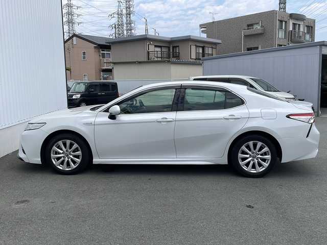 トヨタ カムリ WS 三重県 2019(平31)年 3.4万km プラチナホワイトパールマイカ 衝突軽減　レーンキープ　純正９型ナビ　フルセグＴＶ　ＣＤ　Ｂｌｕｅｔｏｏｔｈ　バックカメラ　ドラレコ　追従型クルコン　コーナーセンサー　オートマチックハイビーム　パドルシフト　ハーフレザーシート　スマートキー　プッシュスタート　USB　ビルトインETC　オートライト　ステアリングスイッチ　横滑り防止　純正アルミ　純正フロアマット　電動格納ミラー