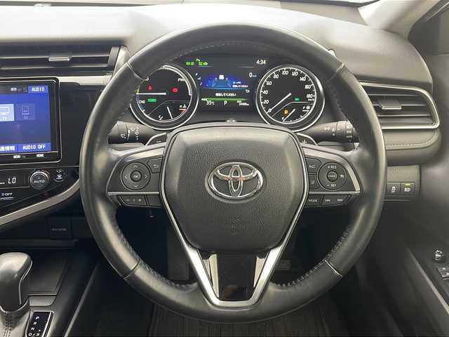 トヨタ カムリ WS 沖縄県 2019(平31)年 3.4万km プラチナホワイトパールマイカ 純正９インチナビ　【NSZT-Y68T】/　（フルセグＴＶ、ＣＤ、Ｂｌｕｅｔｏｏｔｈ）/バックカメラ/衝突軽減/レーンキープアシスト/純正ドライブレコーダー前方/アダプティブクルーズコントロール/コーナーセンサー/オートマチックハイビーム/パドルシフト/ハーフレザーシート/LEDヘッドライト/D席パワーシート/LEDヘッドライト/オートライト/純正アルミホイール