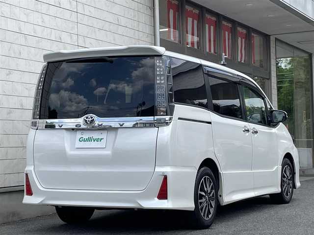 トヨタ ヴォクシー ZS 煌Ⅱ 埼玉県 2016(平28)年 7.7万km ホワイトパールクリスタルシャイン レーダーブレーキサポート/レーンキープ/オートハイビーム/純正10インチナビゲーション/純正後席フリップダウンモニター/CD/DVD/Bluetooth/フルセグTV/バックカメラ/7人乗り/両側電動スライドドア/FRコーナーセンサー/LEDヘッドライト/アイドリングストップ/スマートキー/スペアキー/ETC