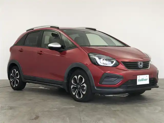 ホンダ フィット e:HEVクロスター 愛知県 2020(令2)年 4.7万km プレミアムクリスタルレッドM ホンダセンシング/　　・衝突軽減ブレーキシステム/　　・路外逸脱抑制機能/　　・アダプティブクルーズコントロール/　　・車線維持支援システム/　　・オートハイビーム/純正7インチナビ/　　・CD/BT/バックカメラ/ETC/革巻きステアリング/ステアリングリモコン/ルーフレール/純正LEDヘッドライト/純正16インチアルミホイール/取扱説明書/保証書/スペアキー