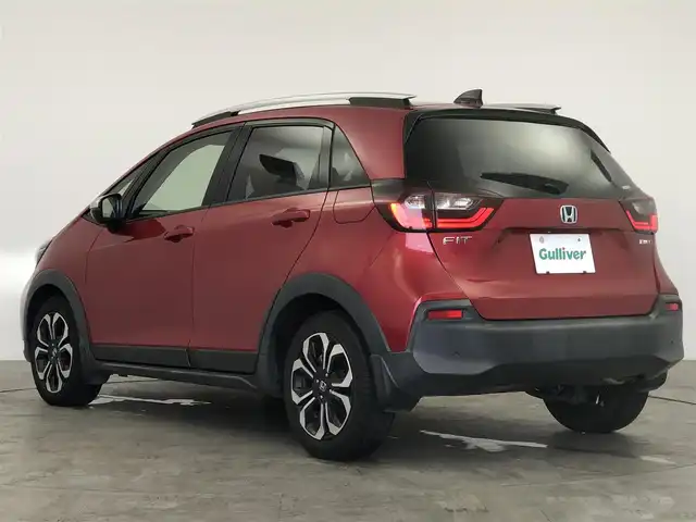 ホンダ フィット e:HEVクロスター 愛知県 2020(令2)年 4.7万km プレミアムクリスタルレッドM ホンダセンシング/　　・衝突軽減ブレーキシステム/　　・路外逸脱抑制機能/　　・アダプティブクルーズコントロール/　　・車線維持支援システム/　　・オートハイビーム/純正7インチナビ/　　・CD/BT/バックカメラ/ETC/革巻きステアリング/ステアリングリモコン/ルーフレール/純正LEDヘッドライト/純正16インチアルミホイール/取扱説明書/保証書/スペアキー
