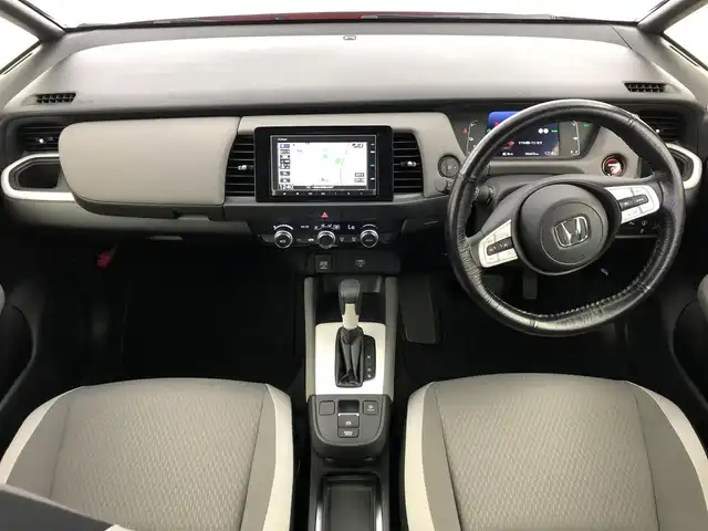 ホンダ フィット e:HEVクロスター 愛知県 2020(令2)年 4.7万km プレミアムクリスタルレッドM ホンダセンシング/　　・衝突軽減ブレーキシステム/　　・路外逸脱抑制機能/　　・アダプティブクルーズコントロール/　　・車線維持支援システム/　　・オートハイビーム/純正7インチナビ/　　・CD/BT/バックカメラ/ETC/革巻きステアリング/ステアリングリモコン/ルーフレール/純正LEDヘッドライト/純正16インチアルミホイール/取扱説明書/保証書/スペアキー