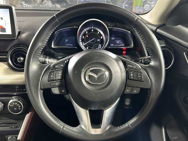 マツダ ＣＸ－３ XD ツーリング Lパッケージ 沖縄県 2015(平27)年 7.2万km ソウルレッドプレミアムメタリック 禁煙車/純正7インチナビ/【CD/DVD/フルセグTV/BT】/バックカメラ/ヘッドアップディスプレイ/ビルトインETC/ハーフレザーシート/シートヒーター/衝突被害軽減システム/レーンキープアシスト/ブラインドスポットモニター/オートマチックハイビーム/オートライト/オートワイパー/純正フロアマット/革巻きステアリング/LEDヘッドライト/18インチ純正アルミ