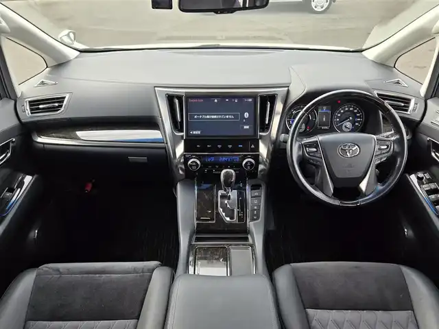 トヨタ ヴェルファイア ハイブリット ZR 鹿児島県 2016(平28)年 8.2万km ホワイトパールクリスタルシャイン モデリスタエアロ/後席フリップダウンモニター　/ビルトインＥＴＣ　/両側パワースライドドア　/レーダークルーズコントロール　/パワーバックドア　/純正ＳＤナビ（ＮＳＺＮ－Ｚ６６Ｔ）　/Ｂｌｕｅｔｏｏｔｈオーディオ　/フルセグテレビ/D+N席パワーシート/オットマン/バックカメラ/純正アルミホイール(17インチ)/前後コーナーセンサー/横滑り防止装置/エアバッグ(W+サイド)/カーテンエアバッグ/プッシュスタート/スマートキー