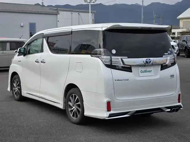 トヨタ ヴェルファイア ハイブリット ZR 鹿児島県 2016(平28)年 8.2万km ホワイトパールクリスタルシャイン モデリスタエアロ/後席フリップダウンモニター　/ビルトインＥＴＣ　/両側パワースライドドア　/レーダークルーズコントロール　/パワーバックドア　/純正ＳＤナビ（ＮＳＺＮ－Ｚ６６Ｔ）　/Ｂｌｕｅｔｏｏｔｈオーディオ　/フルセグテレビ/D+N席パワーシート/オットマン/バックカメラ/純正アルミホイール(17インチ)/前後コーナーセンサー/横滑り防止装置/エアバッグ(W+サイド)/カーテンエアバッグ/プッシュスタート/スマートキー