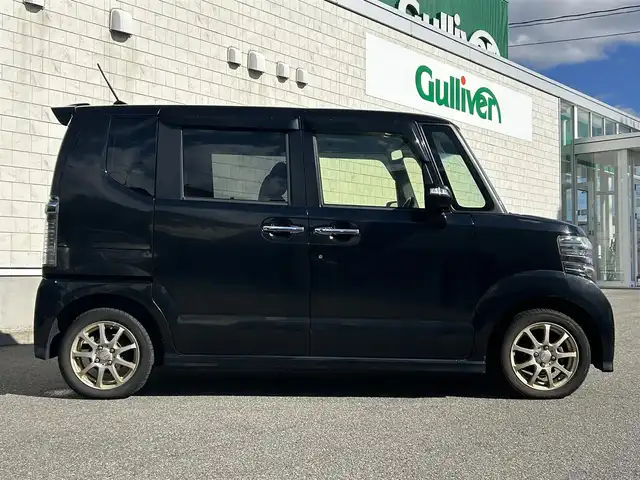 ホンダ Ｎ ＢＯＸ カスタム G Lパッケージ 山形県 2015(平27)年 13.7万km スマートブラック 社外SDナビ/フルセグTV/Bluetooth/DVD再生/横滑り防止装置/盗難防止装置/片側パワースライドドア/ベンチシート/純正フロアマット/社外AW/スマートキー