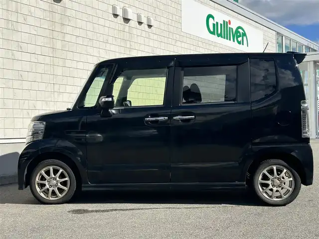 ホンダ Ｎ ＢＯＸ カスタム G Lパッケージ 山形県 2015(平27)年 13.7万km スマートブラック 社外SDナビ/フルセグTV/Bluetooth/DVD再生/横滑り防止装置/盗難防止装置/片側パワースライドドア/ベンチシート/純正フロアマット/社外AW/スマートキー