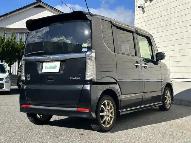 ホンダ Ｎ ＢＯＸ カスタム G Lパッケージ 山形県 2015(平27)年 13.7万km スマートブラック 社外SDナビ/フルセグTV/Bluetooth/DVD再生/横滑り防止装置/盗難防止装置/片側パワースライドドア/ベンチシート/純正フロアマット/社外AW/スマートキー