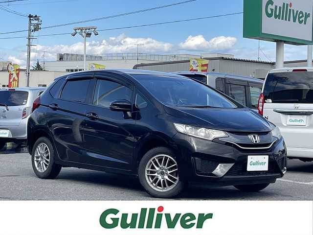 ホンダ フィット 13G Lパッケージ 青森県 2013(平25)年 5.4万km クリスタルブラックパール ４WD/社外オーディオ（CD/AM/FM）/スマートキー/横滑り防止/アイドリングストップ/衝突被害軽減システム/純正フロアマット/アクセサリーソケット