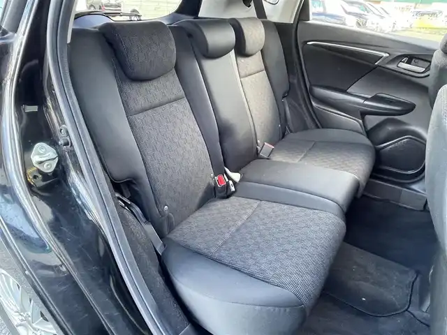 ホンダ フィット 13G Lパッケージ 青森県 2013(平25)年 5.4万km クリスタルブラックパール ４WD/社外オーディオ（CD/AM/FM）/スマートキー/横滑り防止/アイドリングストップ/衝突被害軽減システム/純正フロアマット/アクセサリーソケット