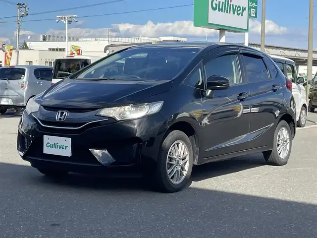 ホンダ フィット 13G Lパッケージ 青森県 2013(平25)年 5.4万km クリスタルブラックパール ４WD/社外オーディオ（CD/AM/FM）/スマートキー/横滑り防止/アイドリングストップ/衝突被害軽減システム/純正フロアマット/アクセサリーソケット