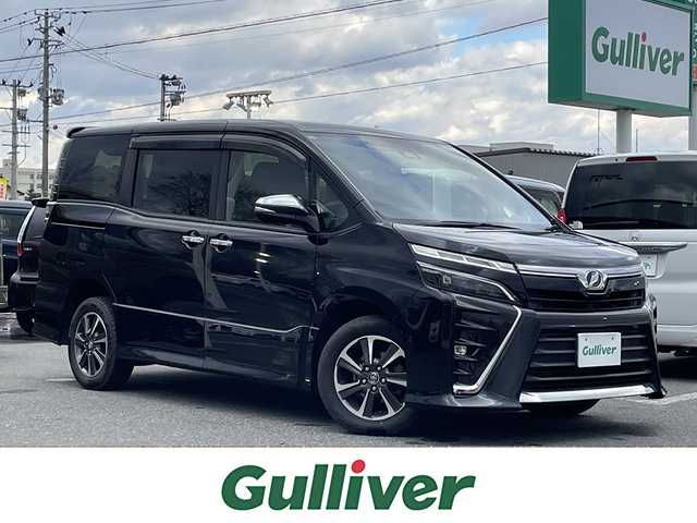 トヨタ ヴォクシー ZS 煌 青森県 2017(平29)年 4.9万km ブラック 4WD/ワンオーナー/純正メモリーナビ/フルセグTV/CD/DVD/BT/後席用フリップダウンモニター/両側パワースライドドア/トヨタセーフティセンス/プリクラッシュセーフティ/レーンキープアシスト/オートマチックハイビーム/ETC/クルーズコントロール/LEDオートライト