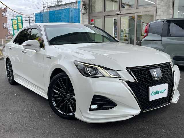 トヨタ クラウン ハイブリッド アスリートSJ-フロンティアLTD 福岡県 2018(平30)年 7.7万km ホワイトパールクリスタルシャイン サンルーフ/モデリスタエアロ/モデリスタマフラー/トヨタセーフティーセンス/・プリクラッシュセーフティ/・レーダークルーズコントロール/・レーントレーシングアシスト/・オートマチックハイビーム/・レーンディパーチャーアラート/純正メモリナビ/DTV/　CD/DVD/BT/BD/AUX/SD/USB/ハーフレザーシート/前席パワーシート/前席シートヒーター/バックカメラ/クリアランスソナー/純正ドライブレコーダー/プッシュスタート/ドアバイザー/スペアタイヤ/純正ビルトイン2.0ETC/ユピテルレーダー探知機/【SCX-R203】