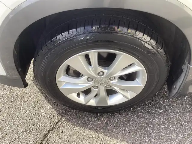 ホンダ ヴェゼル ハイブリッド X 千葉県 2015(平27)年 11.1万km ホワイトオーキッドパール ワンオーナー 車/純正ナビゲーション/Bluetooth/CD/TV/バックカメラ/スマートキー×2/LEDヘッドライト/横滑り防止装置/取り扱い説明書有り/ドライブレコーダー/ETC