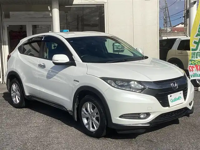 ホンダ ヴェゼル ハイブリッド X 千葉県 2015(平27)年 11.1万km ホワイトオーキッドパール ワンオーナー 車/純正ナビゲーション/Bluetooth/CD/TV/バックカメラ/スマートキー×2/LEDヘッドライト/横滑り防止装置/取り扱い説明書有り/ドライブレコーダー/ETC