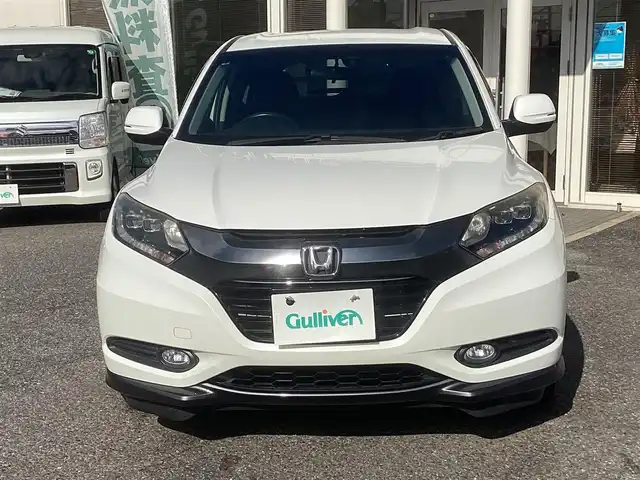 ホンダ ヴェゼル ハイブリッド X 千葉県 2015(平27)年 11.1万km ホワイトオーキッドパール ワンオーナー 車/純正ナビゲーション/Bluetooth/CD/TV/バックカメラ/スマートキー×2/LEDヘッドライト/横滑り防止装置/取り扱い説明書有り/ドライブレコーダー/ETC