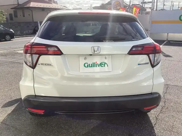 ホンダ ヴェゼル ハイブリッド X 千葉県 2015(平27)年 11.1万km ホワイトオーキッドパール ワンオーナー 車/純正ナビゲーション/Bluetooth/CD/TV/バックカメラ/スマートキー×2/LEDヘッドライト/横滑り防止装置/取り扱い説明書有り/ドライブレコーダー/ETC
