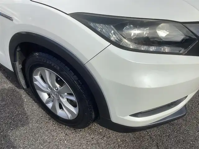 ホンダ ヴェゼル ハイブリッド X 千葉県 2015(平27)年 11.1万km ホワイトオーキッドパール ワンオーナー 車/純正ナビゲーション/Bluetooth/CD/TV/バックカメラ/スマートキー×2/LEDヘッドライト/横滑り防止装置/取り扱い説明書有り/ドライブレコーダー/ETC