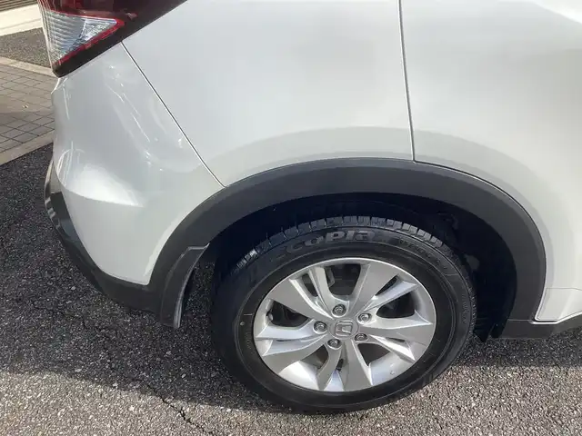 ホンダ ヴェゼル ハイブリッド X 千葉県 2015(平27)年 11.1万km ホワイトオーキッドパール ワンオーナー 車/純正ナビゲーション/Bluetooth/CD/TV/バックカメラ/スマートキー×2/LEDヘッドライト/横滑り防止装置/取り扱い説明書有り/ドライブレコーダー/ETC