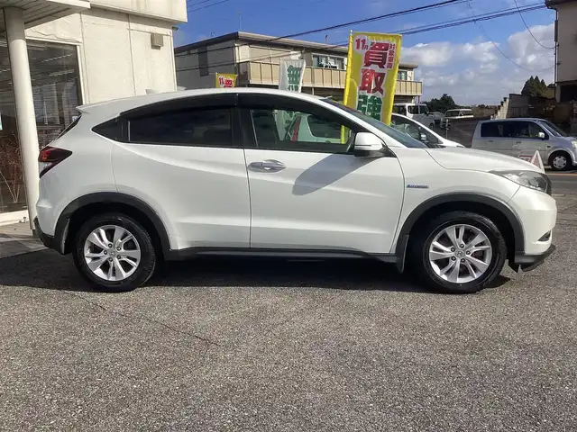 ホンダ ヴェゼル ハイブリッド X 千葉県 2015(平27)年 11.1万km ホワイトオーキッドパール ワンオーナー 車/純正ナビゲーション/Bluetooth/CD/TV/バックカメラ/スマートキー×2/LEDヘッドライト/横滑り防止装置/取り扱い説明書有り/ドライブレコーダー/ETC