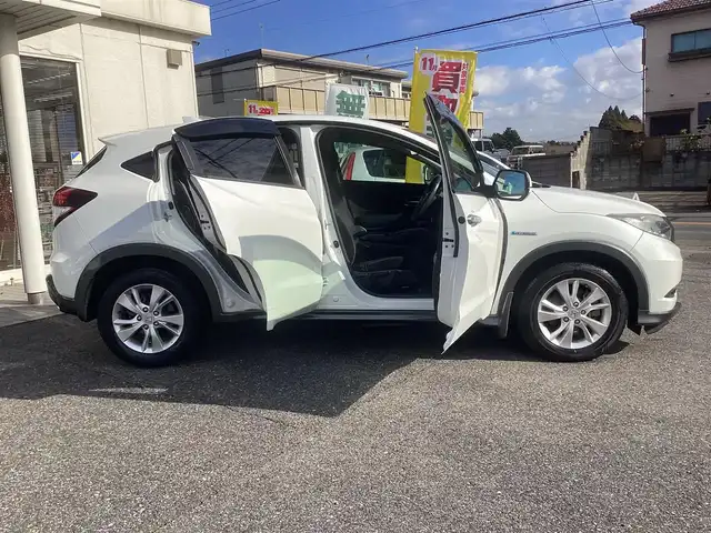 ホンダ ヴェゼル ハイブリッド X 千葉県 2015(平27)年 11.1万km ホワイトオーキッドパール ワンオーナー 車/純正ナビゲーション/Bluetooth/CD/TV/バックカメラ/スマートキー×2/LEDヘッドライト/横滑り防止装置/取り扱い説明書有り/ドライブレコーダー/ETC