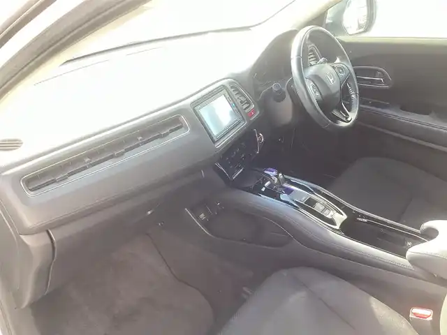 ホンダ ヴェゼル ハイブリッド X 千葉県 2015(平27)年 11.1万km ホワイトオーキッドパール ワンオーナー 車/純正ナビゲーション/Bluetooth/CD/TV/バックカメラ/スマートキー×2/LEDヘッドライト/横滑り防止装置/取り扱い説明書有り/ドライブレコーダー/ETC