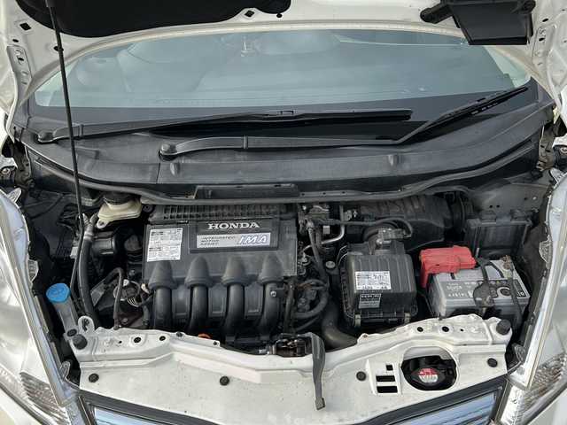 ホンダ フィット ハイブリット スマート セレクション 兵庫県 2011(平23)年 8.4万km プレミアムホワイトパール 社外ナビ（ワンセグ/FM/AM//Bluetooth）/スマートキー/クルーズコントロール/ＥＴＣ/ＵＳＢ/純正フロアマット/ステアリングリモコン/オートライト/ドアバイザー