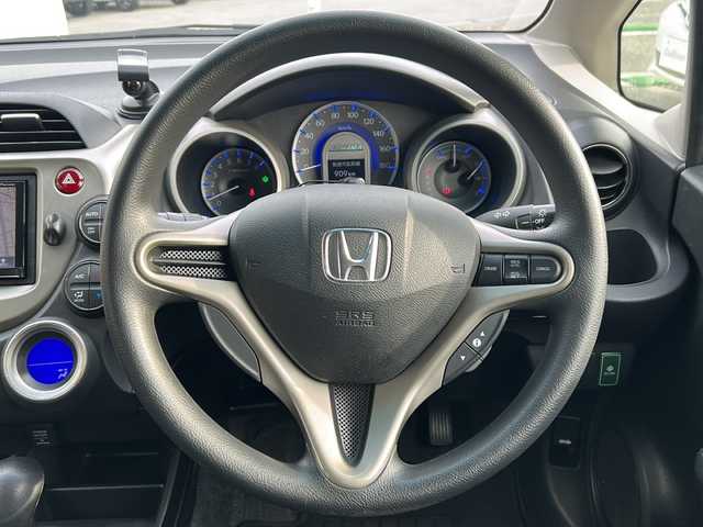 ホンダ フィット ハイブリット スマート セレクション 兵庫県 2011(平23)年 8.4万km プレミアムホワイトパール 社外ナビ（ワンセグ/FM/AM//Bluetooth）/スマートキー/クルーズコントロール/ＥＴＣ/ＵＳＢ/純正フロアマット/ステアリングリモコン/オートライト/ドアバイザー