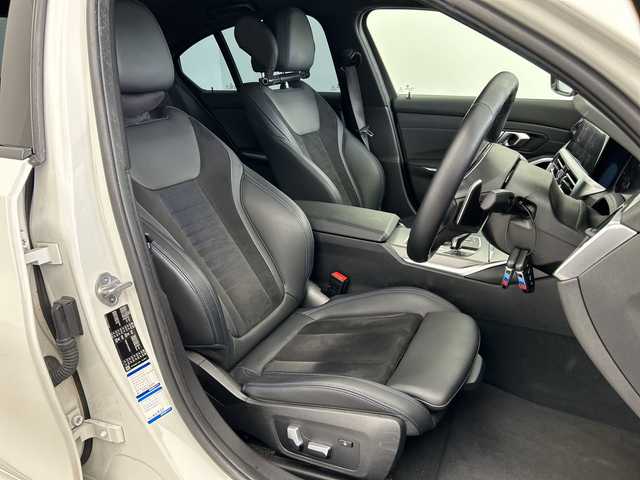 ＢＭＷ ３２０ｉ Mスポーツ 三重県 2020(令2)年 7万km 白 /禁煙車//BMWライブ・コックピット：//12.3インチ マルチ・ディスプレイ・メーター・パネル//10.25インチ ワイド・コントロール・ディスプレイ//HDDナビゲーション・システム//Mスポーツ専用マルチファンクション/　Mスポーツ・レザー・ステアリング・ホイール（パドルシフト付）//Mスポーツ専用スポーツ・シート（運転席&助手席）//アルカンタラ／センサテック・コンビネーション・シート/＜カラー：ブラック（ブルー・ステッチ付）＞//パーキング・アシスト：//PDC//パーキング・アシスト（並列・縦列）//リヤ・ビュー・カメラ（予想進路表示機能付）//ワイヤレス充電//レーダークルーズコントロール//インテリジェントセーフティ//衝突軽減ブレーキ//レーンキープアシスト//ブラインドスポットモニター//オートハイビーム//純正前後ドライブレコーダー