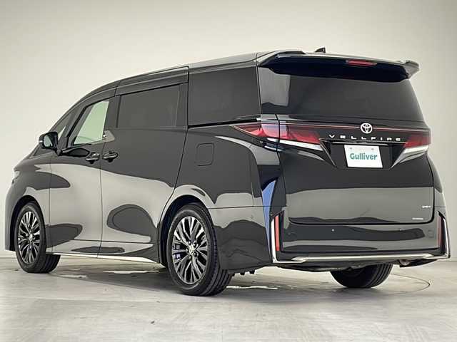 トヨタ ヴェルファイア ハイブリット Z プレミア 愛知県 2024(令6)年 0.6万km ブラック 衝突軽減システム/純正14型ディズプレイオーディオ　ナビあり/フリップダウンモニター/三眼LEDヘッドライト/全方位カメラ/両側パワースライドドア/ガラスルーフ/レーダークルーズコントロール/シートヒーター/エアシート/フルセグ/Bluetooth/バックカメラ/電動リアゲート/パワーシート/ヘッドアップディスプレイ/コーナーセンサー/純正アルミホイール/ETC2.0/ブラインドスポットモニター/パドルシフト/ステアリングヒーター/インテリジェントミラー/リアオートエアコン/オートマチックハイビーム/ドライブレコーダー/ETC/ステアリングスイッチ/スマートキー/プッシュスタートクルーズコントロール
