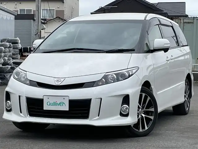 トヨタ エスティマ アエラス 道央・札幌 2012(平24)年 4.6万km ホワイトパールクリスタルシャイン ４WD/純正ディーラーOPナビ/CD/DVD/BT/フルセグ/クルーズコントロール/バックカメラ/ビルトインETC/センターデフロック/ECOMODE/両側パワースライドドア/ステアリングリモコン/MTモード付AT/レーダー探知機/プッシュスタート/スマートキー/HIDヘッドライト/オートライト/フォグランプ/電動格納ミラー/ウィンカーミラー/純正フロアマット/ドアバイザー