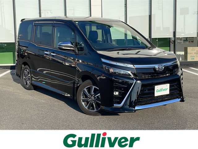トヨタ ヴォクシー ZS 煌Ⅲ 岐阜県 2021(令3)年 1.9万km ブラック 純正ＳＤナビ　/後席モニター/ビルトインＥＴＣ　/バックカメラ　/前後ドライブレコーダー　/衝突軽減システム　/盗難防止装置　/横滑り防止装置　/前後コーナーセンサー　/アイドリングストップ　/ＬＥＤヘッドライト　/オートライト/ハーフレザーシート/純正16インチアルミホイール/プッシュスタート/スマートキー/スペアキー/純正フロアマット
