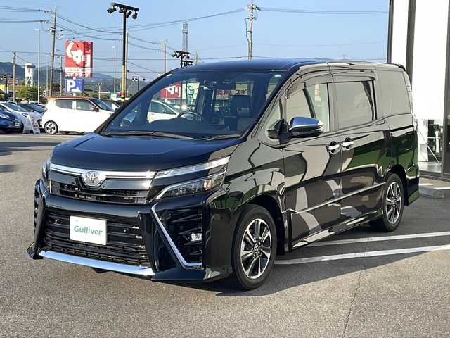 トヨタ ヴォクシー ZS 煌Ⅲ 岐阜県 2021(令3)年 1.9万km ブラック 純正ＳＤナビ　/後席モニター/ビルトインＥＴＣ　/バックカメラ　/前後ドライブレコーダー　/衝突軽減システム　/盗難防止装置　/横滑り防止装置　/前後コーナーセンサー　/アイドリングストップ　/ＬＥＤヘッドライト　/オートライト/ハーフレザーシート/純正16インチアルミホイール/プッシュスタート/スマートキー/スペアキー/純正フロアマット