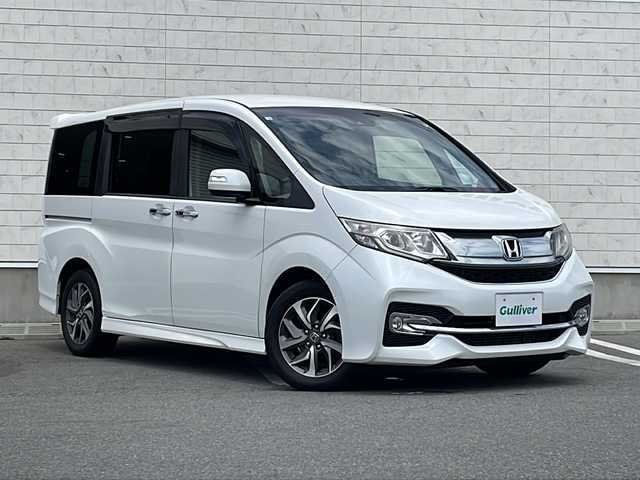 ホンダ ステップワゴン スパーダ 山形県 2016(平28)年 8.4万km ホワイトオーキッドパール 禁煙車/バックカメラ/アダプティブクルーズコントロール/車線維持支援システム/純正ナビ/（FM/AM/CD/DVD/SD/BT)/フルセグTV/ドライブレコーダー/ETC/片側パワースライドドア/LEDヘッドライト/わくわくゲート/16インチ純正アルミホイール/スペアキー/スマートキー/プッシュスタート