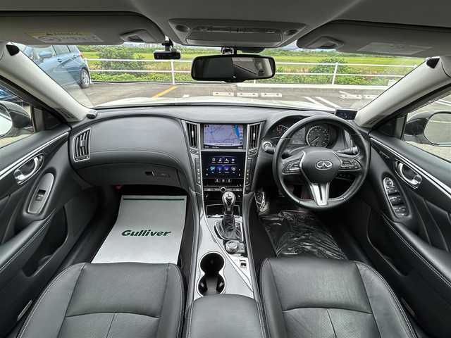 日産 スカイライン ハイブリッド 350GT Type P 佐賀県 2019(平31)年 6.4万km ブリリアントホワイトパール 純正8型ナビゲーション/・AM/FM/BT/CD/DVD/フルセグ//・インテリジェントアラウンドビューモニター/・黒革シート/・パワーシート「運転席/助手席」/・シートヒーター/・イージーエントリー＆イージーエグジット機能/LEDヘッドライト/・オートマチックハイビーム/純正18インチアルミホイール/フロアMTモード付/スマートキー/純正フロアマット/純正ドアバイザー/新車保証書/取扱説明書/スペアキー1本/ETC/インテリジェントセーフティー/・インテリジェント エマージェンシーブレーキ/・インテリジェント クルーズコントロール（全車速追従）/・インテリジェント LI/・LDW（車線逸脱警報）/・BSW（後側方車両検知警報）/・BCI（後退時衝突防止支援システム）/・MOD（移動物検知機能付アラウンドビューモニター）/・インテリジェント ドライビングアシスト/・踏み間違い衝突防止アシスト/・前方衝突予測警報（PFCW）/・ふらつき警報