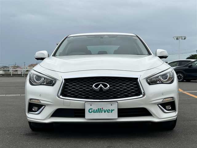 日産 スカイライン ハイブリッド 350GT Type P 佐賀県 2019(平31)年 6.4万km ブリリアントホワイトパール 純正8型ナビゲーション/・AM/FM/BT/CD/DVD/フルセグ//・インテリジェントアラウンドビューモニター/・黒革シート/・パワーシート「運転席/助手席」/・シートヒーター/・イージーエントリー＆イージーエグジット機能/LEDヘッドライト/・オートマチックハイビーム/純正18インチアルミホイール/フロアMTモード付/スマートキー/純正フロアマット/純正ドアバイザー/新車保証書/取扱説明書/スペアキー1本/ETC/インテリジェントセーフティー/・インテリジェント エマージェンシーブレーキ/・インテリジェント クルーズコントロール（全車速追従）/・インテリジェント LI/・LDW（車線逸脱警報）/・BSW（後側方車両検知警報）/・BCI（後退時衝突防止支援システム）/・MOD（移動物検知機能付アラウンドビューモニター）/・インテリジェント ドライビングアシスト/・踏み間違い衝突防止アシスト/・前方衝突予測警報（PFCW）/・ふらつき警報