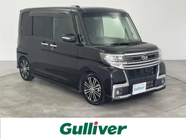 ダイハツ タント カスタム RS トップED SAⅡ 大分県 2016(平28)年 11.2万km ブラックマイカメタリック 社外SDナビ/（フルセグ/CD/DVD/Bluetooth）/スマートアシストII/・衝突軽減ブレーキ/・踏み間違え防止/・車線逸脱警報機能/バックカメラ/革調シートカバー/両側パワースライドドア/オートリトラミラー/純正アルミホイール/オートライト/LEDヘッドライト/スマートキー・プッシュスタート/保証書・取扱説明書