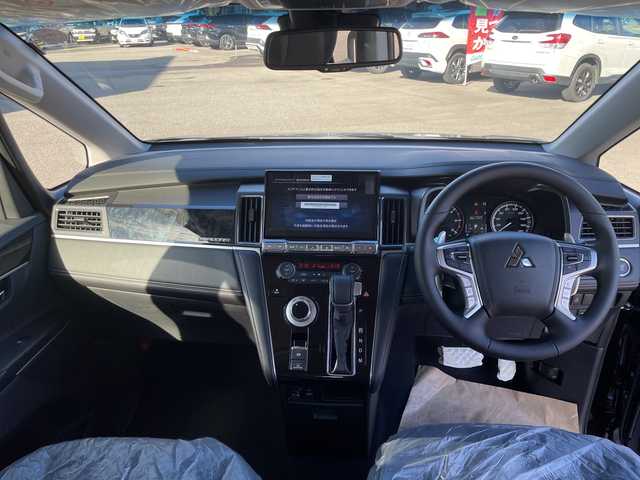 三菱 デリカＤ：５ シャモニー 石川県 2025(令7)年 0.1千km グラファイトグレーメタリック/ブラックマイカ 登録未使用車/禁煙車/4WD/e-Assist/アラウンドビューモニター/両側パワースライドドア/パワーバックドア/レーダークルーズコントロール/LEDオートライト/オートマチックハイビーム/ハーフレザーシート/前席シートヒーター/純正18インチアルミホイール/パドルシフト/アイドリングストップ/ステアリングヒーター/スペアキー/スマートキー