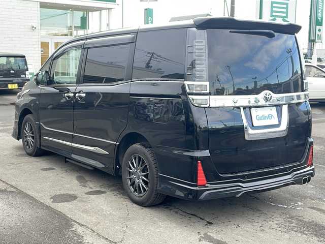 トヨタ ヴォクシー ZS 煌Ⅲ 道東・釧路十勝 2020(令2)年 2.6万km ブラック 4WD/寒冷地仕様/ワンオーナー/フルモデリスタエアロ/オートステップ/純正エンジンスターター/純正夏AWセット積込(205/60R16)/T-conect9インチナビ　NSZT-Y68T/　(AM/FM/CD/DVD/BT/HDMI)/フルセグTV/バックカメラ/両側パワースライドドア/クルーズコントロール/ビルドインETC/社外前後ドライブレコーダー/ワイパーデアイサー/横滑り防止装置/アイドリングストップ/プリクラッシュセーフティ/レーンキープアシスト/オートハイビーム/オートライト/LEDヘッドライト/マフラーカッター/TVキャンセラー/革調シートカバー/取扱説明書/保証書/スペアキー1本