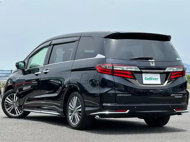 ホンダ オデッセイ ハイブリッド アブソルート ホンダセンシング 島根県 2020(令2)年 2.9万km プレミアムヴィーナスブラックP 純正9インチナビ/CD/DVD/DTV/Bluetooth/HDMI/USB/マルチビューカメラ /純正フリップダウンモニター/レーダークルーズコントロール/両側パワースライドドア/コーナーセンサー /LEDオートライト/ステアリングスイッチ/電子パーキング/ハーフレザー調シート/パワーシート/スマートキー/プッシュスタート /純正フロアマット/ドアバイザー