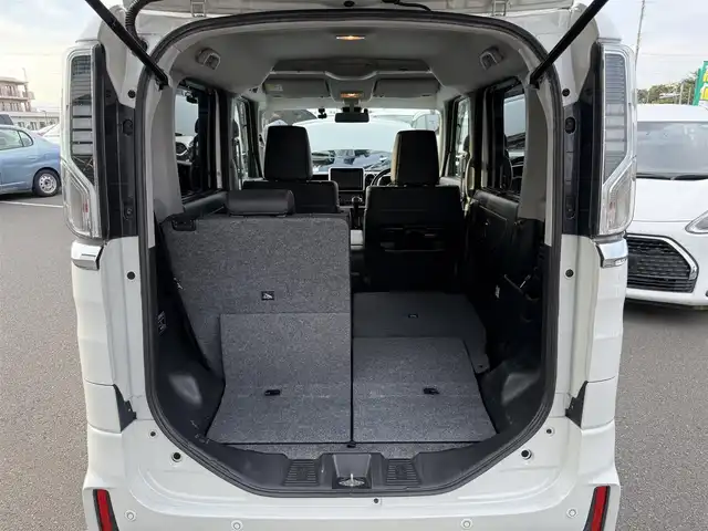 スズキ スペーシア カスタム HYBRID XS ターボ 東京都 2019(令1)年 6.5万km ピュアホワイトP ・ワンオーナー/・スズキセーフティサポート/・デュアルセンサーブレーキサポート/・車線逸脱警報機能/・先行車発進お知らせ機能/・誤発進抑制機能/・クルーズコントロール/・コーナーセンサー/・ヘッドアップディスプレイ/・全方位モニター/・プッシュスタート/・アイドリングストップ/・パドルシフト/・純正メモリーナビ ＜フルセグTV/BT/CD/DVD＞/・ETC/・ドライブレコーダー/・両側パワースライドドア /・ハーフレザーシート/・シートヒーター/・パーソナルテーブル/・後席ロールサンシェード/・スリムサーキュレーター/・SRSエアバッグ（運転席/助手席/サイド）/・LEDヘッドライト/・オートライト/・１５インチ純正アルミホイール/・ドアバイザー/・スマートキー