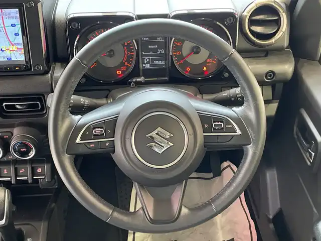 スズキ ジムニー シエラ JC 埼玉県 2023(令5)年 1.9万km ミディアムグレー デュアルセンサーブレーキサポート /純正8インチメモリナビ/　　CD/DVD/BT/フルセグ /バックカメラ /クルーズコントロール /LEDオートライト /シートヒーター /純正15インチアルミホイール /ステアリングスイッチ /ETC